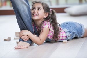 Kid on Hardwood Floor